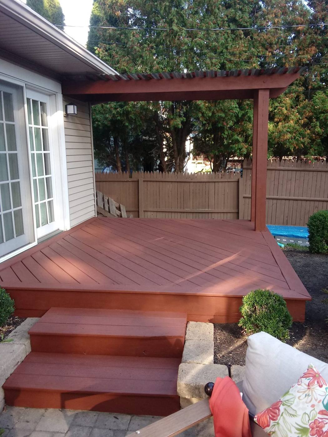 Deck and pergola stained red
